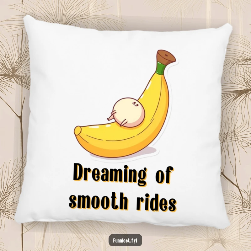 Funny pillow showcasing a small, round character with legs gleefully sliding down a large banana peel, perfect for snuggly laughs.