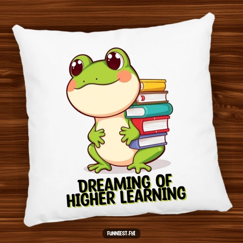 Funny pillow featuring a giggling frog character precariously balancing a tall stack of books on its nose, adding humorous charm to any room.