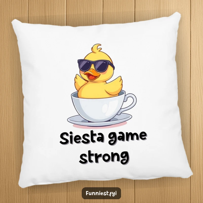 Funny pillow featuring a rubber duck wearing sunglasses, floating upside down in a teacup, perfect for humorous and comfortable decor.