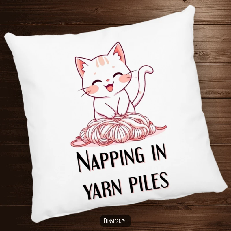 Funny pillow showcasing a smiling cat tripping over its tail into a pile of yarn, perfect for snuggly, humorous times.