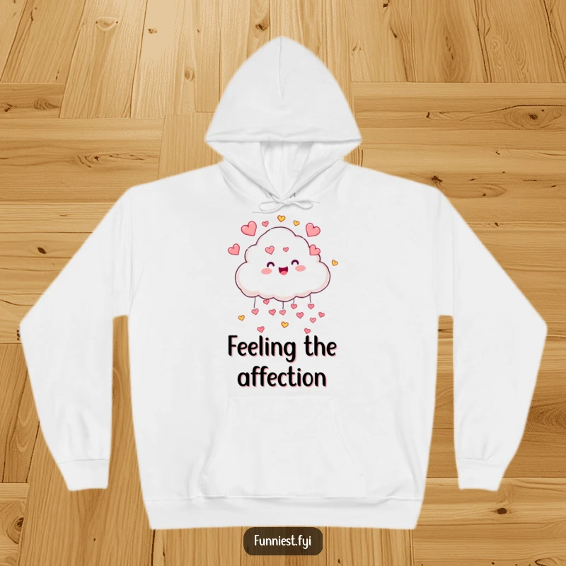 Funny cloud character showering tiny hearts on a hoodie, offering cozy comfort inspired by joyful weather and love.