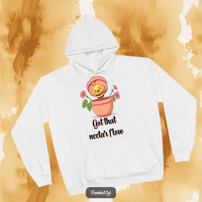 Funny hoodie with a happy bee character comically flying upside down into a giant flowerpot, embodying joyful, chaotic energy.