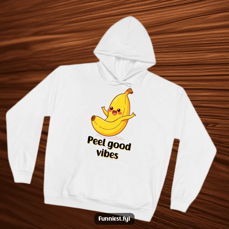 Funny banana character in a happy yelp, tumbling down after slipping on its own peel, on a cozy hoodie.