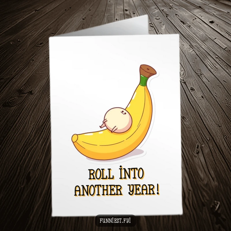 Funny Free Printable Birthday Card: Small round character with tiny legs gleefully rolling down a giant banana peel, perfect for laughs.