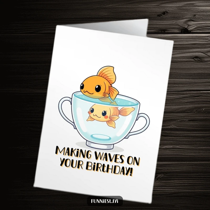 Funny Free Printable Birthday Card: Determined goldfish struggling in a giant teacup, a quirky celebration of effort.