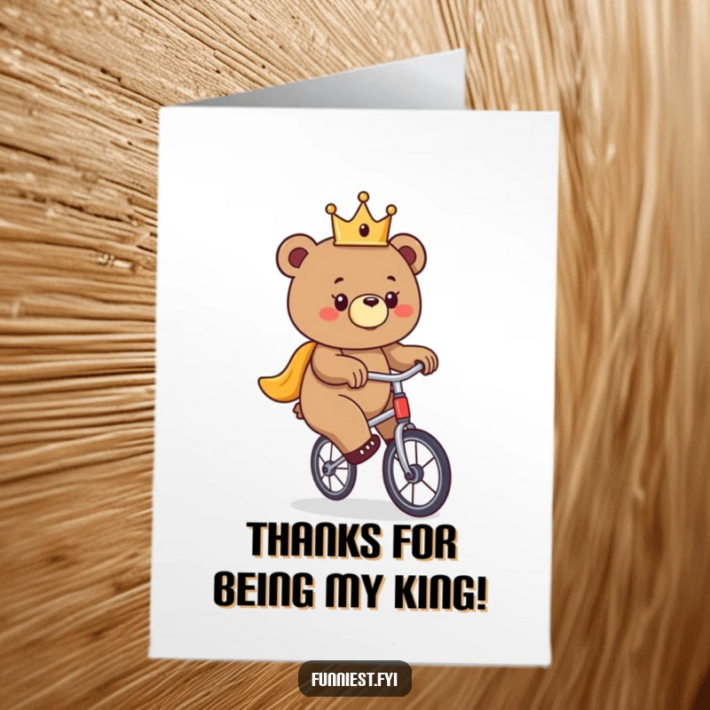Funny Free Printable Thank You Card: A bear wearing a tiny crown attempts to ride a unicycle, humorously expressing thanks.