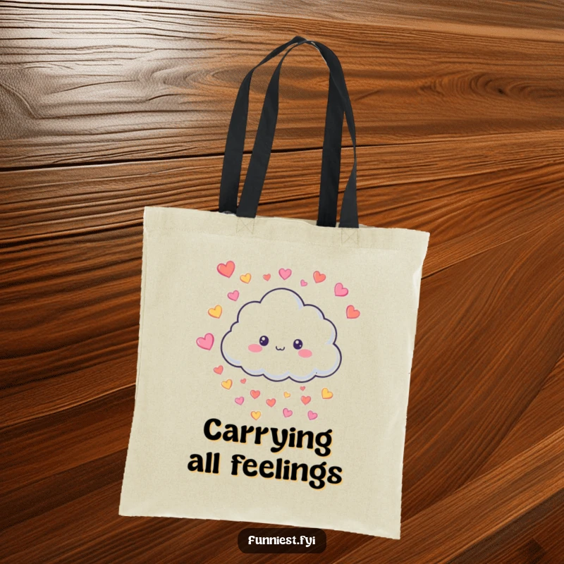 Funny Tote Bag featuring a smiling fluffy cloud character raining colorful hearts, ideal for carrying essentials with a touch of joy.